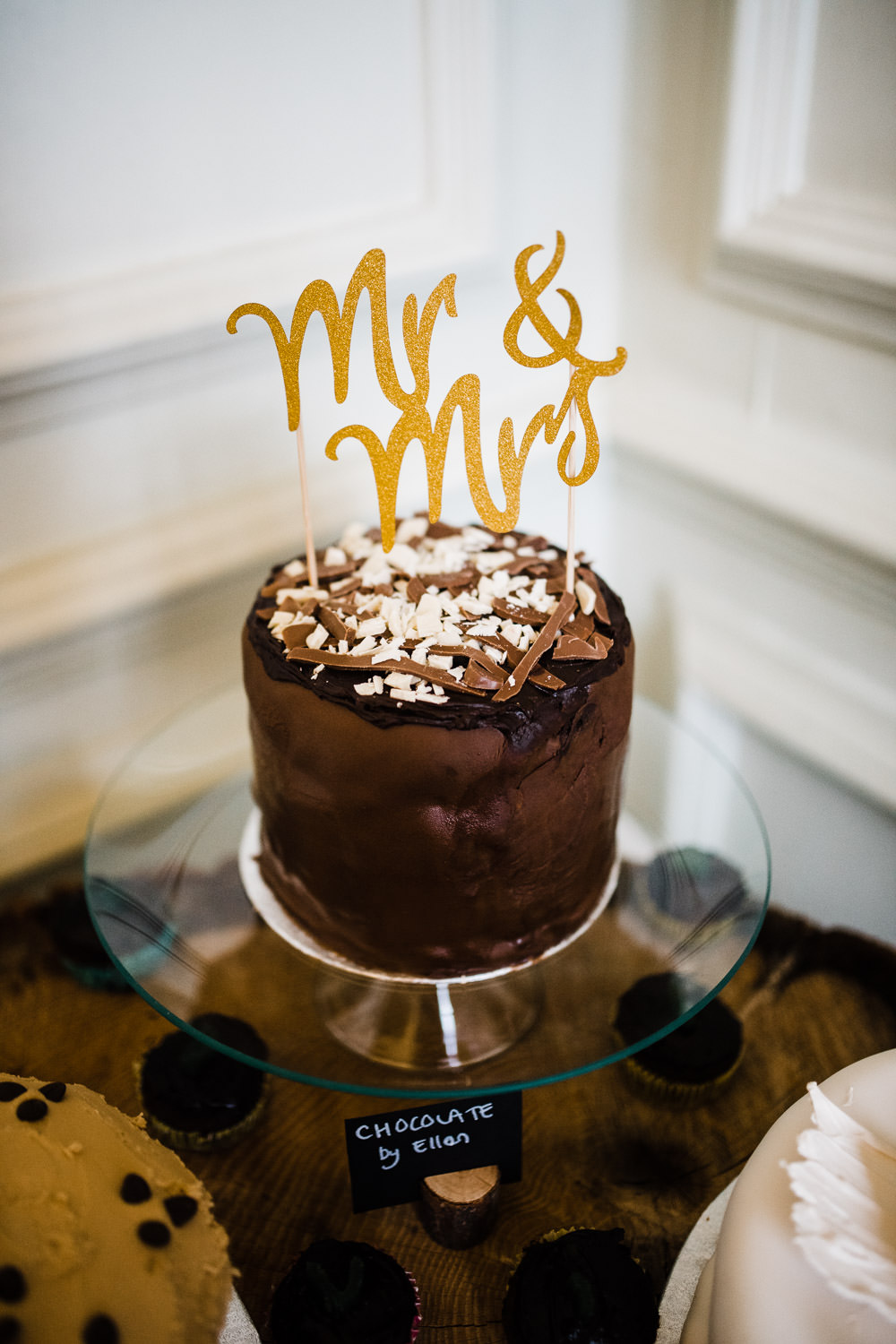 chocolate wedding cake with gold mr and mrs letters