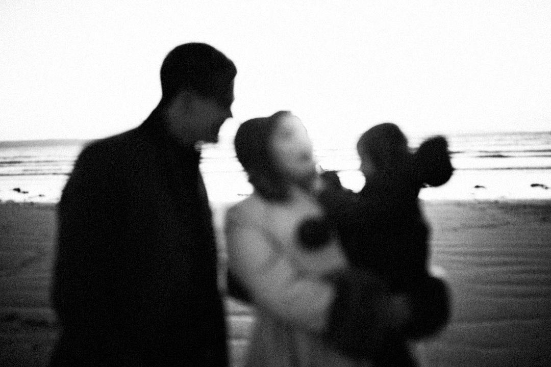 out of focus photo of small family