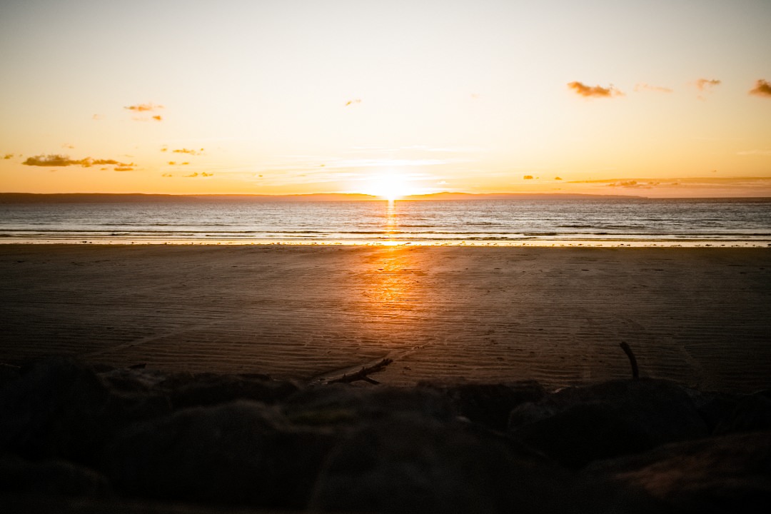 golden sunset on sandy beach