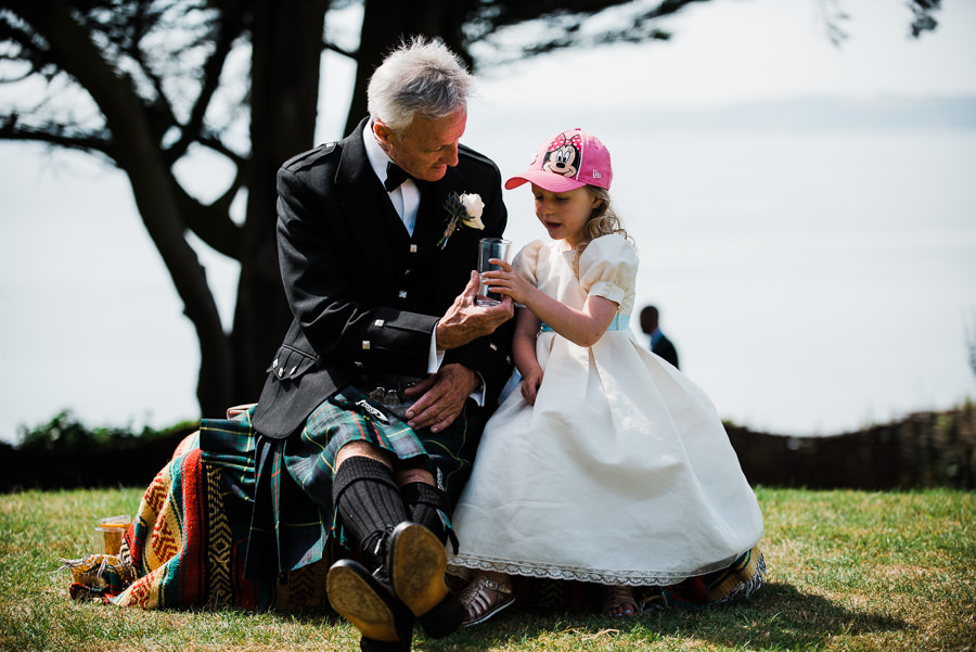 girl and her grandad at wedding