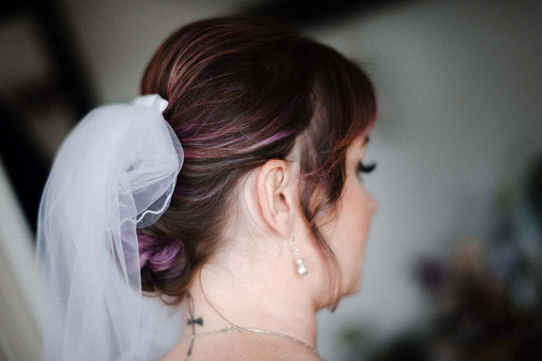 Bride with tattoos and purple hair