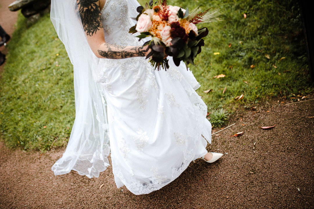 white wedding dress and flowers