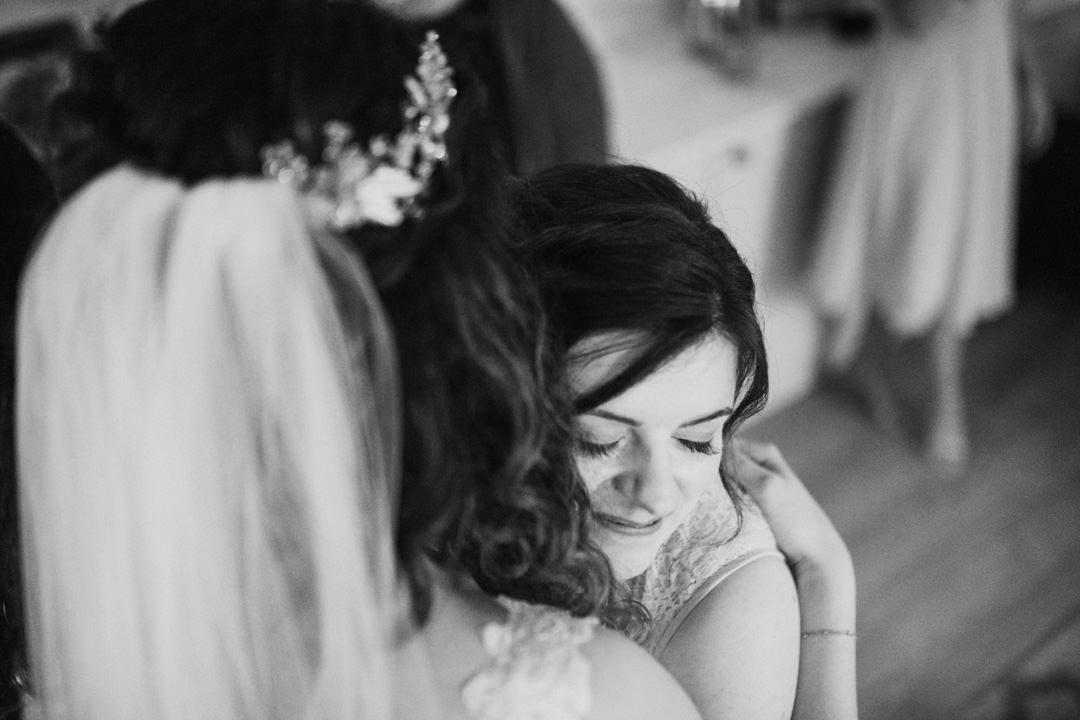 wedding bride hugging girl