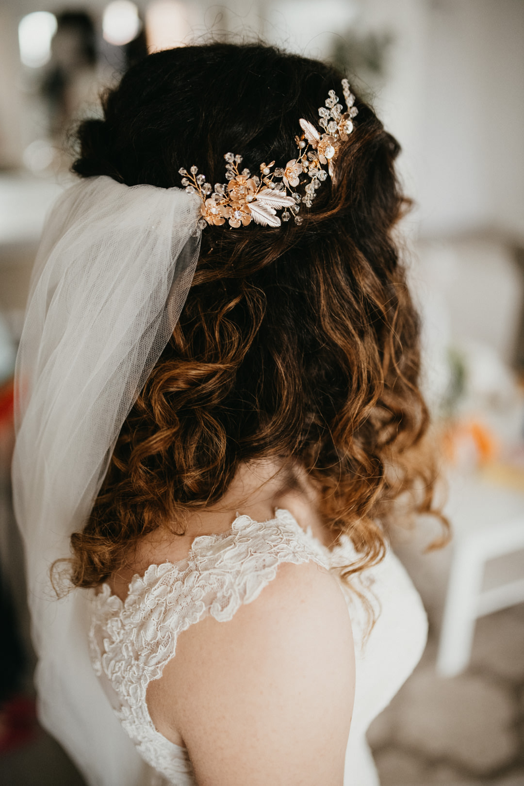 bride with orange flowers in hair