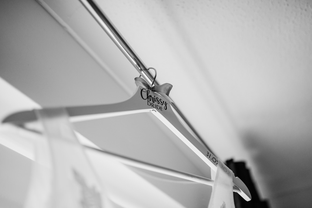 custom wedding dress coat hanger in window