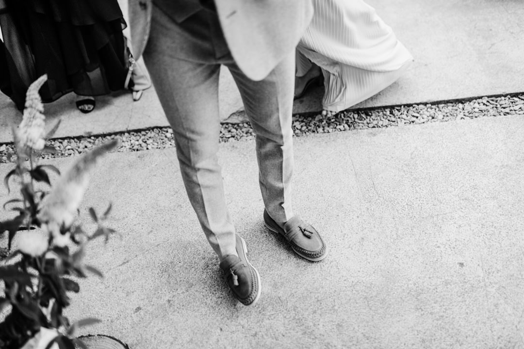 wedding groom waring plimsole shoes