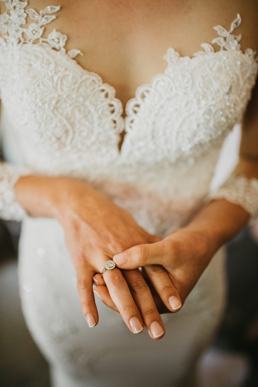 wedding bride holding ring