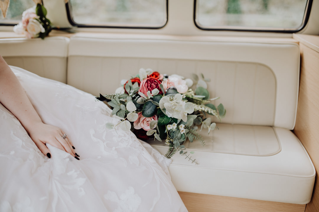 wedding flowers on seat in camper van
