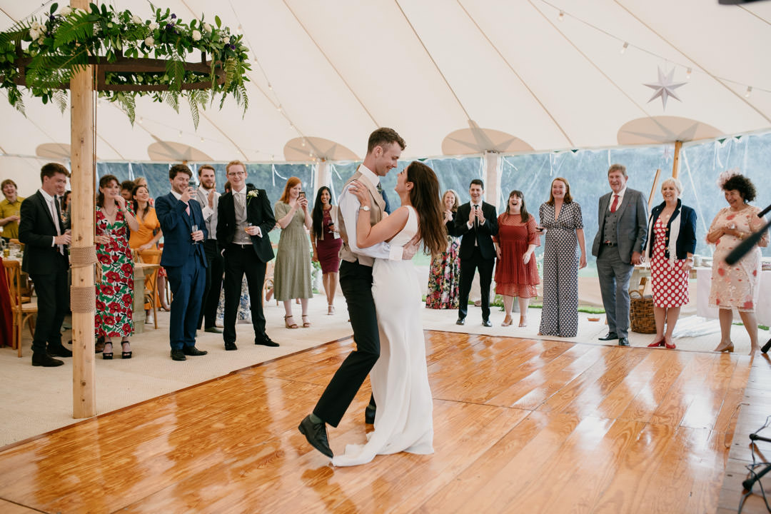 first dance at wedding in large tent