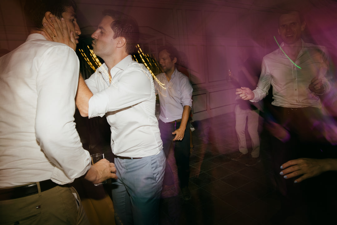 man in white shirt dancing