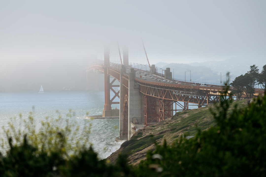 Golden Gate Bridge under cloudy skies