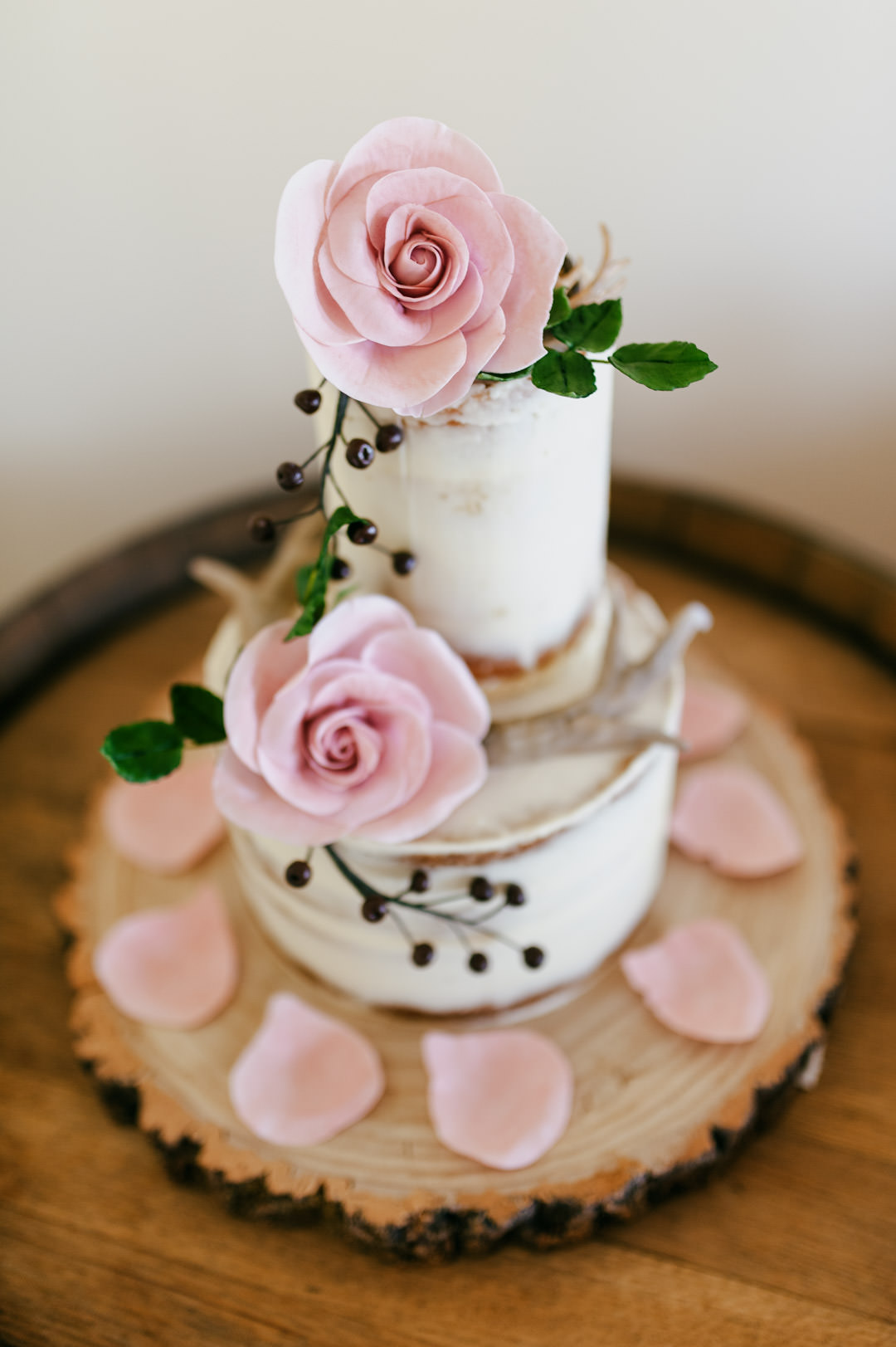 wedding cake with rose topper